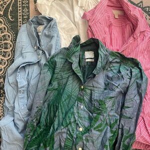 Four collared shirts.  2 Gap size S and 2 Banana Republic size 2.